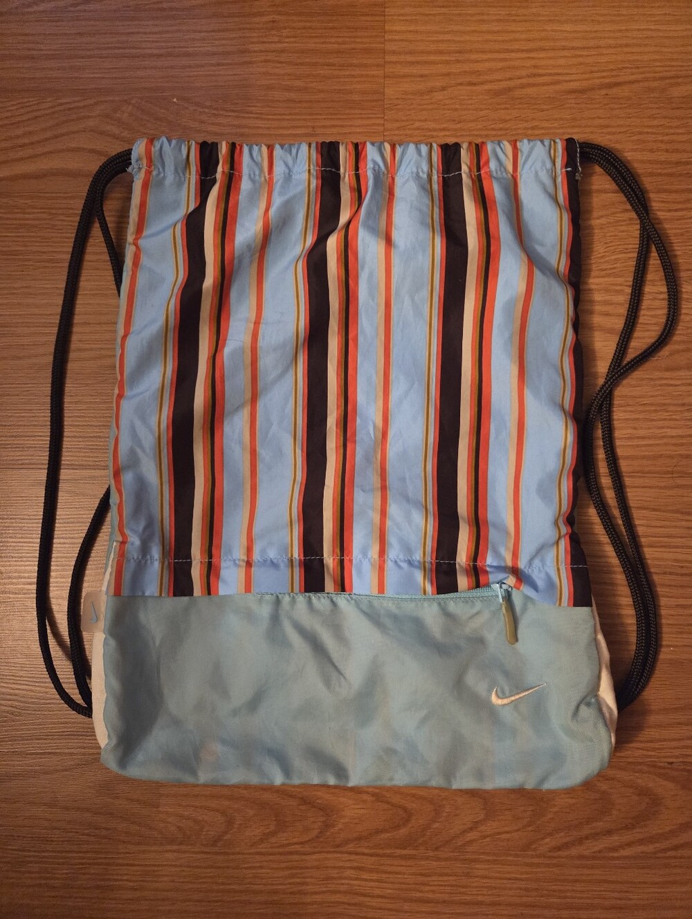 Nike Blue Striped Unisex Drawstring Backpack with Multicolor Accents Zip Pocket